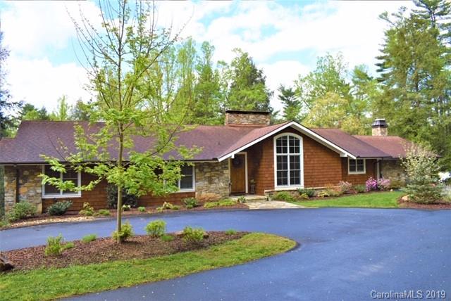 85 Forest Road Asheville, NC 28803 - Photo 38 of 39 a front view of a house with a yard