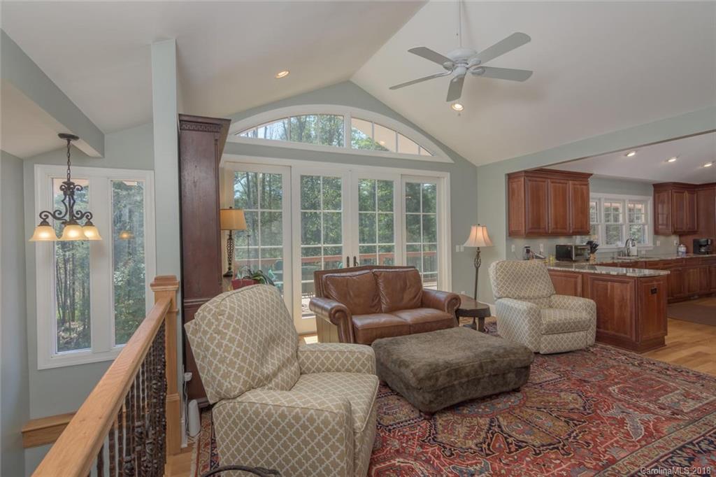 85 Forest Road Asheville, NC 28803 - Photo 8 of 39 a living room with furniture and a large window