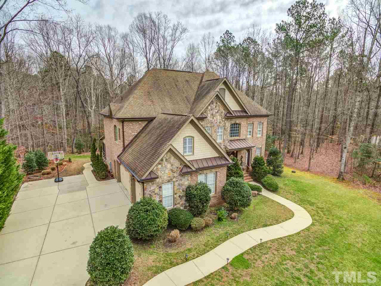 12228 Peed Road Raleigh, NC 27614 - Photo 3 of 30 a front view of a house with garden