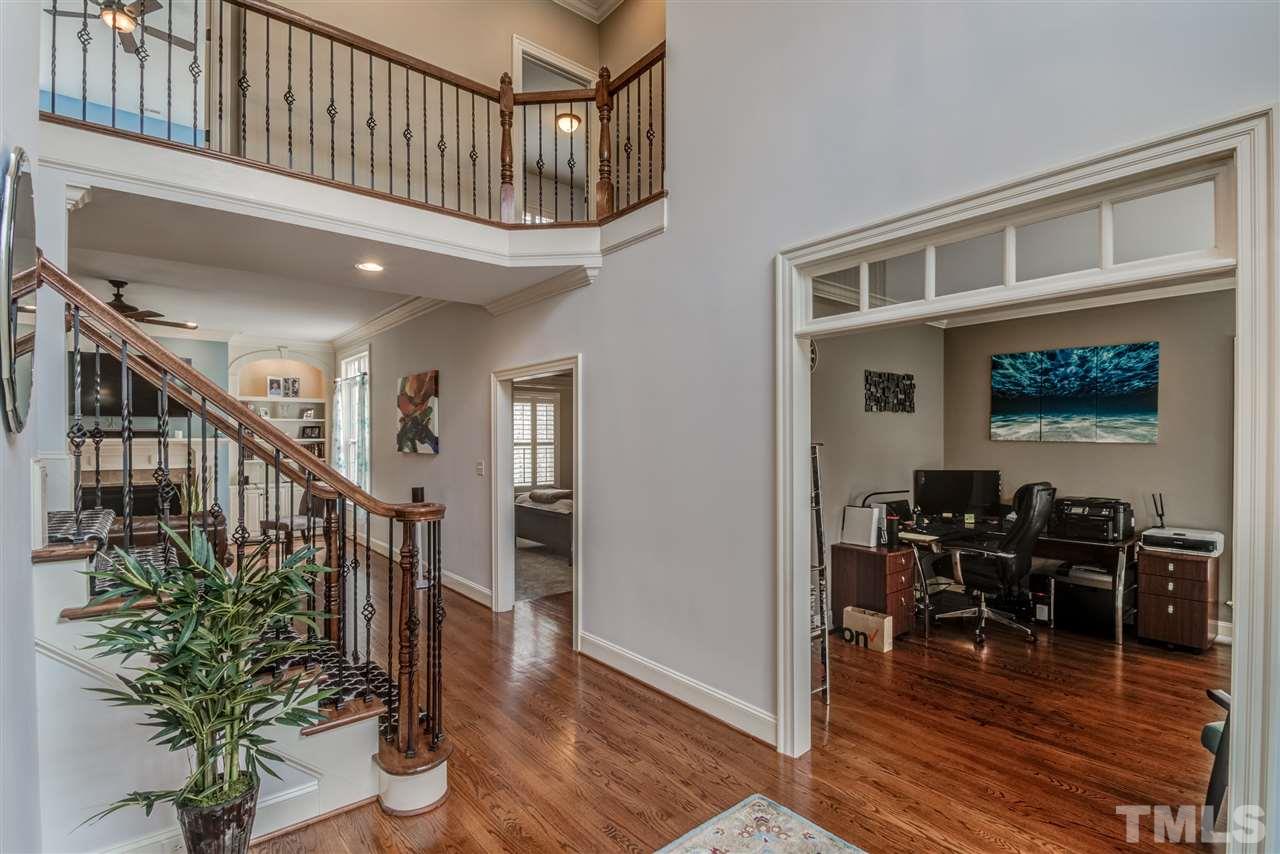 12228 Peed Road Raleigh, NC 27614 - Photo 6 of 30 a view of entryway livingroom and hall with wooden floor