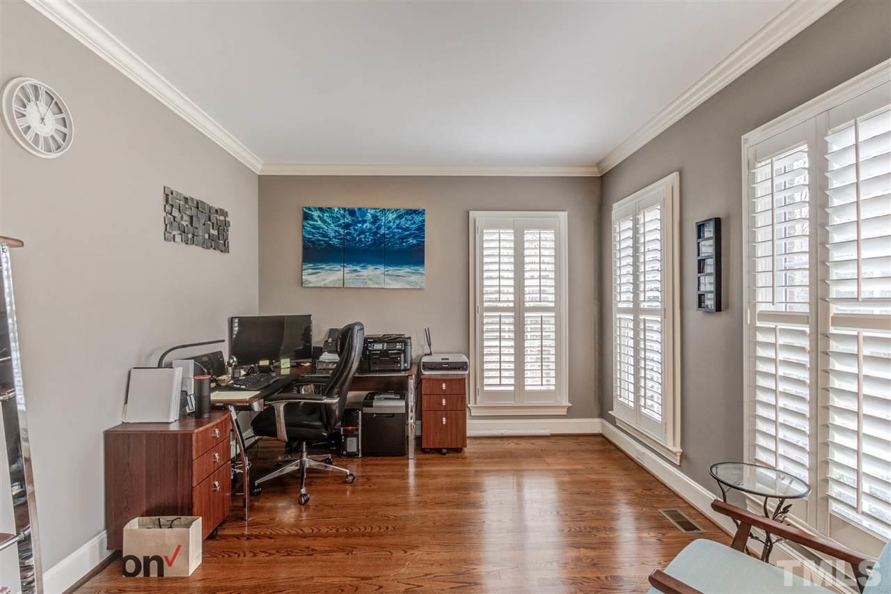 12228 Peed Road Raleigh, NC 27614 - Photo 7 of 30 a view of a livingroom with workspace and a window