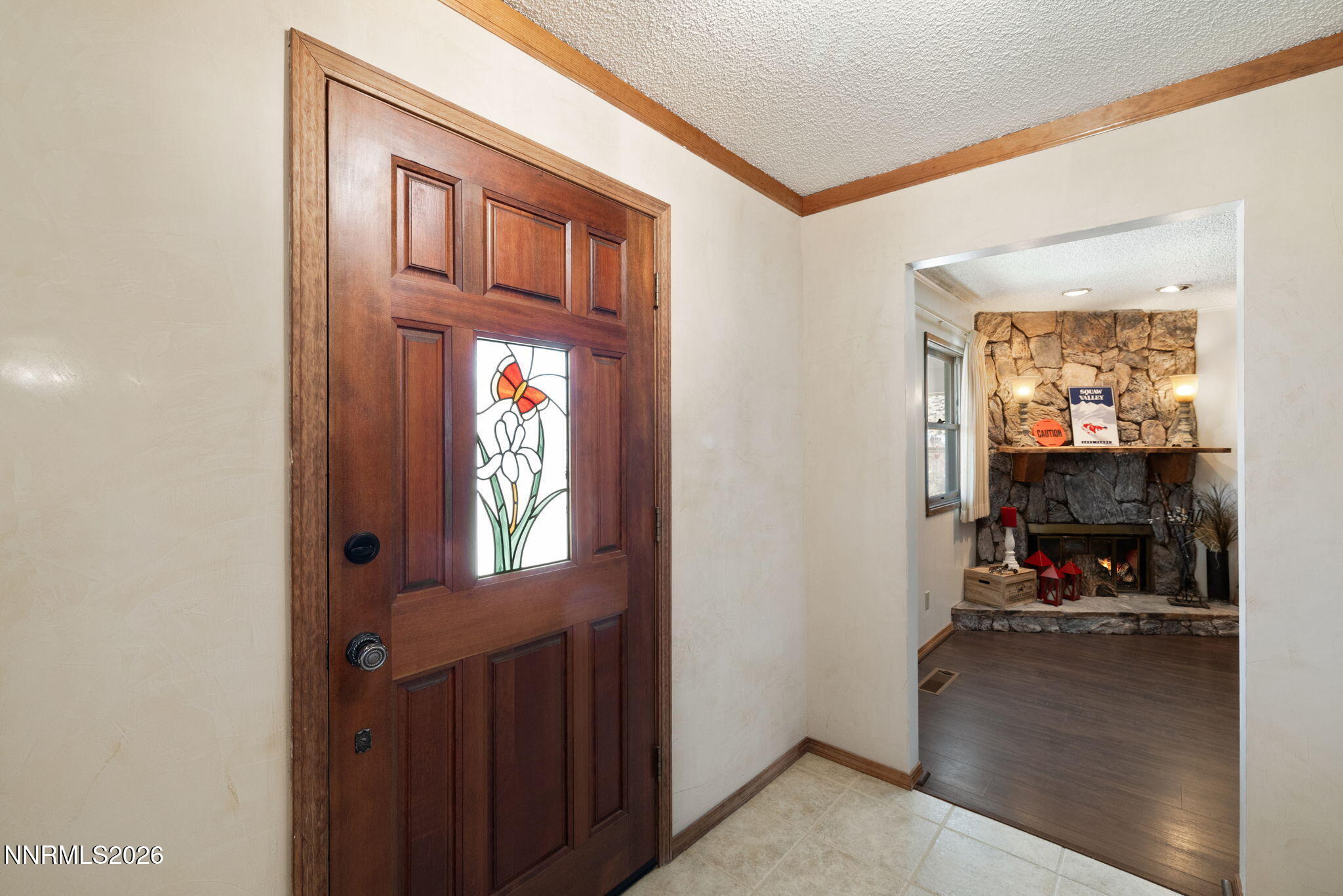 99 Toll Road Virginia City, NV 89440 - Photo 12 of 44 a view of a livingroom with a fireplace and a window