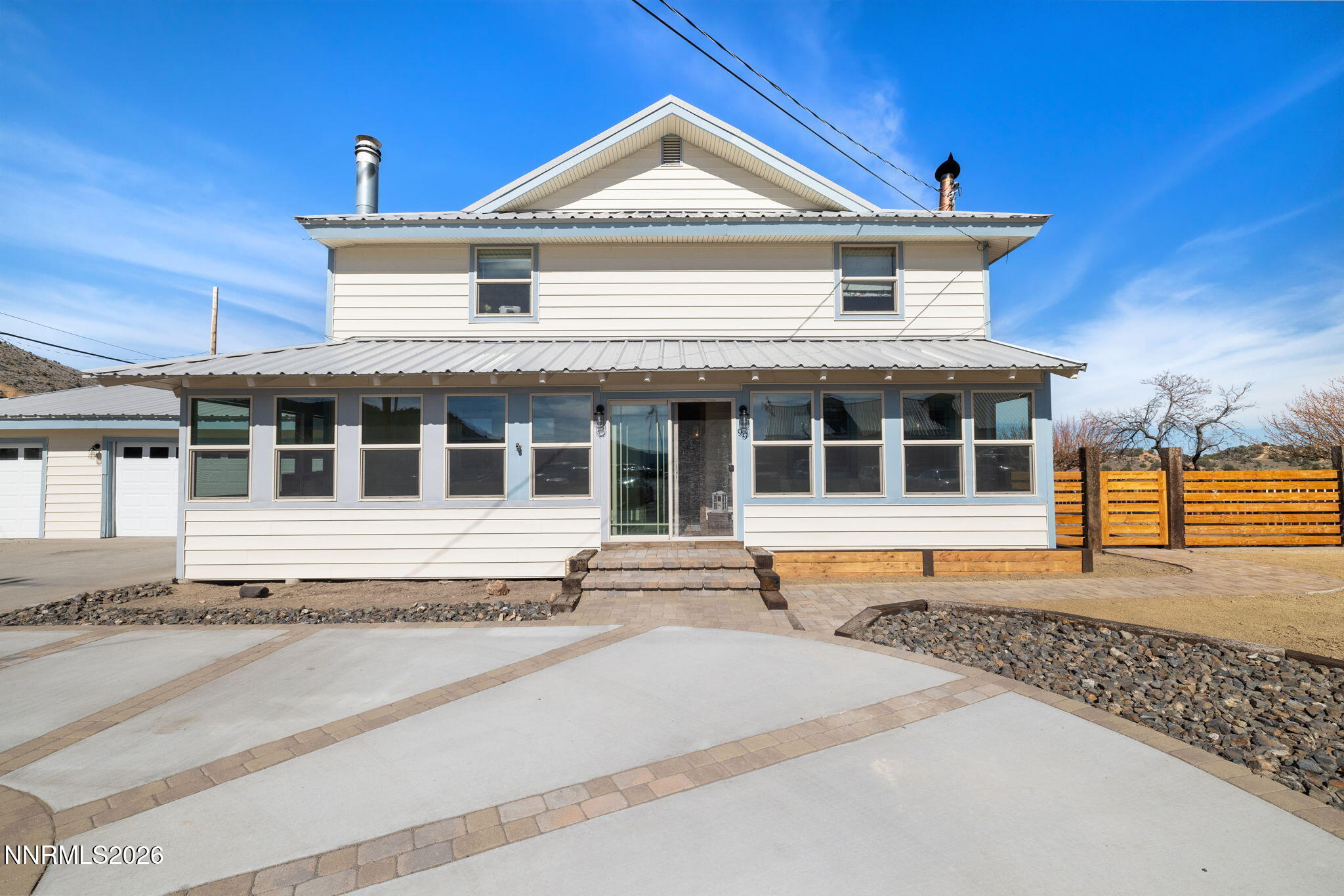 99 Toll Road Virginia City, NV 89440 - Photo 2 of 44 a front view of a house with a yard