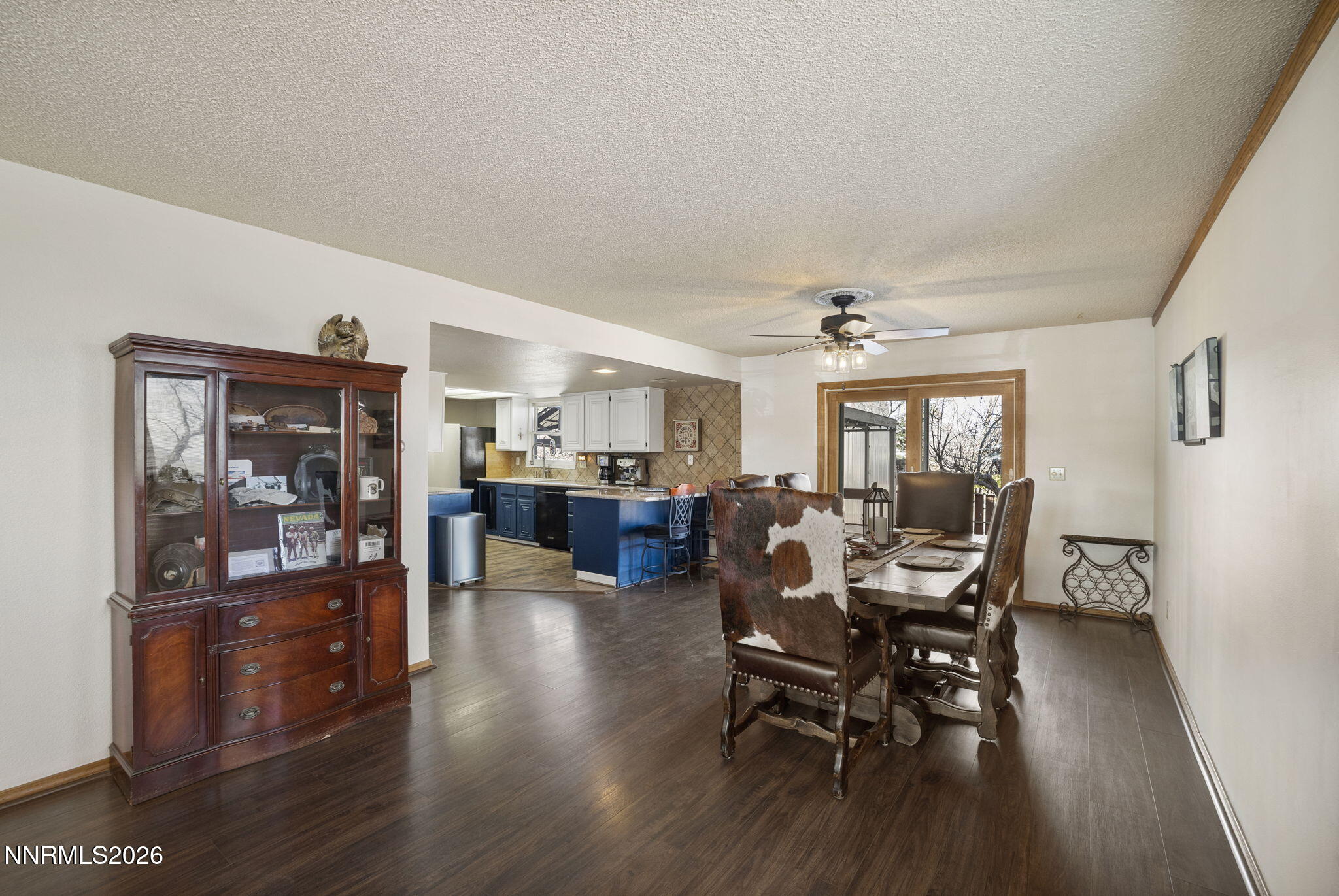 99 Toll Road Virginia City, NV 89440 - Photo 22 of 44 a living room with furniture and a wooden floor