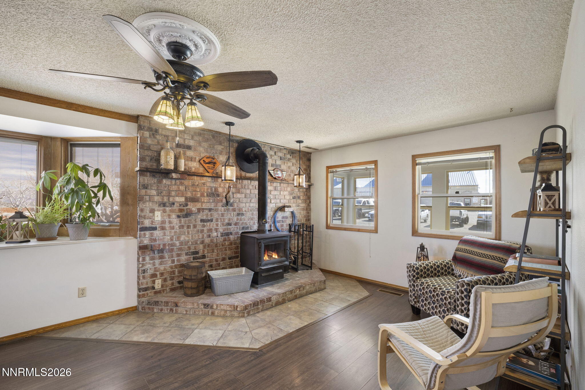 99 Toll Road Virginia City, NV 89440 - Photo 25 of 44 a living room with furniture and a fireplace