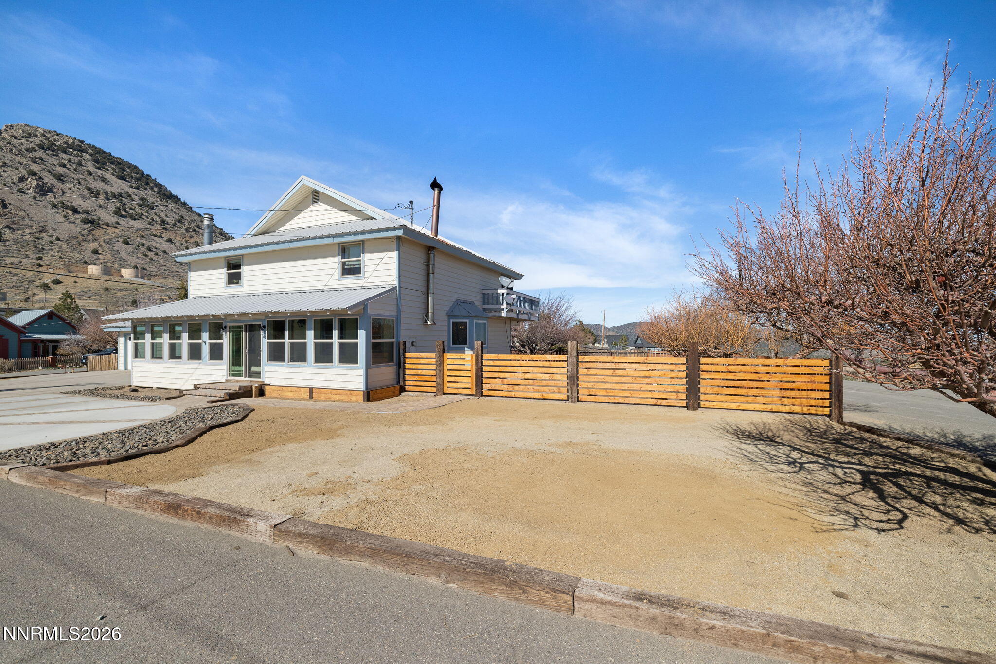 99 Toll Road Virginia City, NV 89440 - Photo 3 of 44 a view of house with yard and entertaining space