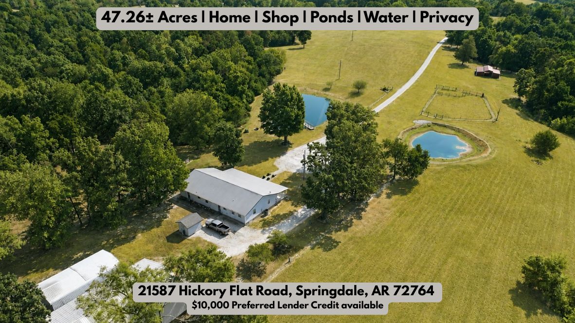 21587 West Hickory Flat Road Springdale, AR 72764 - Photo 1 of 45 Aerial view showcasing approximately 47 acres with open pasture, mature woods, two ponds, residence, shop, barns, and a long private drive.
