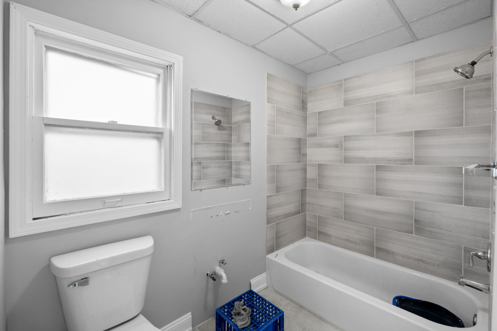 17 West 30th Place Steger, IL 60475 - Photo 9 of 15 a white bath tub sitting next to a white toilet