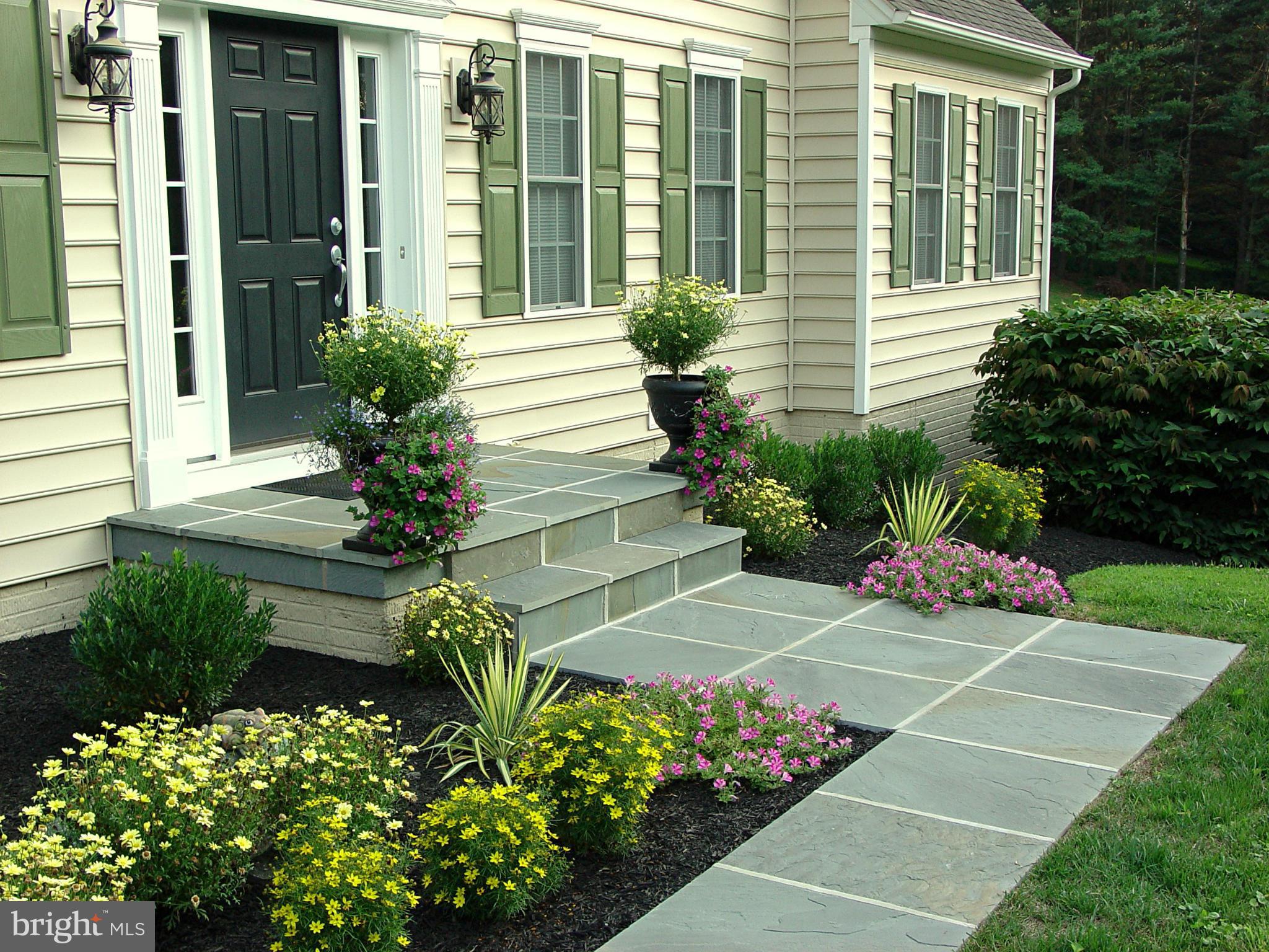 2705 Garrett Road White Hall, MD 21161 - Photo 19 of 30 a view of a house with potted plants