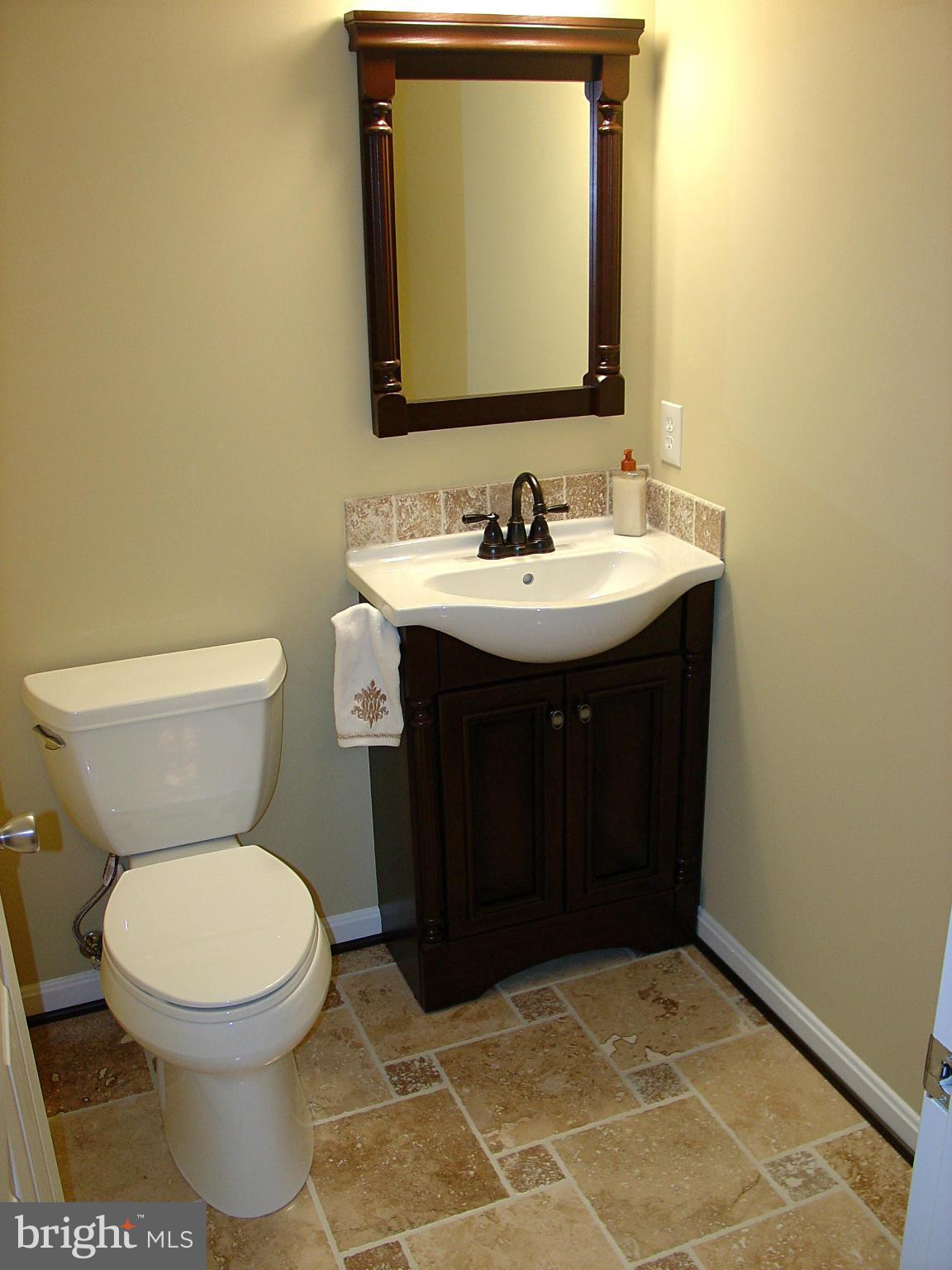 2705 Garrett Road White Hall, MD 21161 - Photo 24 of 30 a bathroom with a sink toilet and mirror