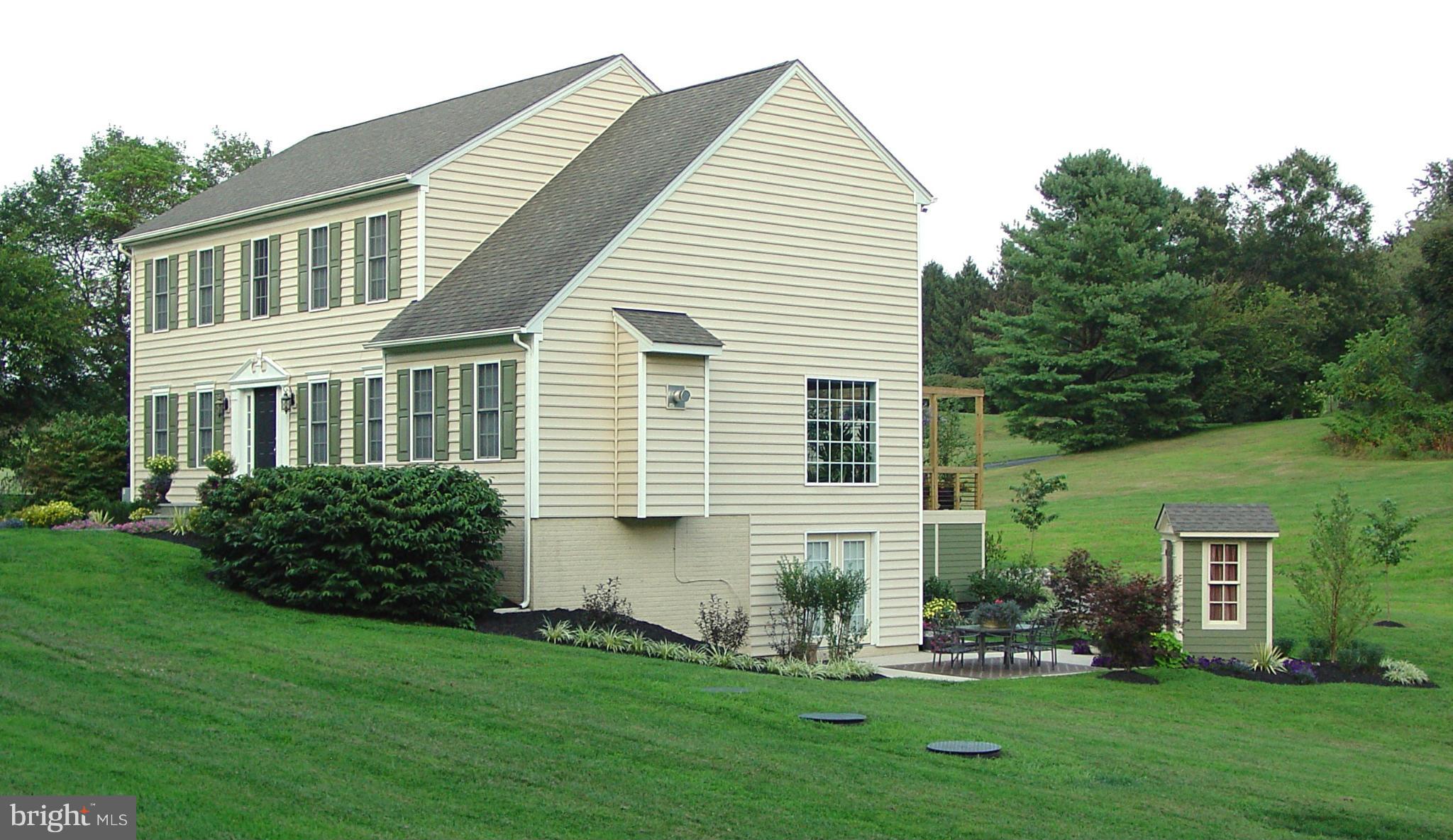 2705 Garrett Road White Hall, MD 21161 - Photo 9 of 30 a front view of a house with a yard