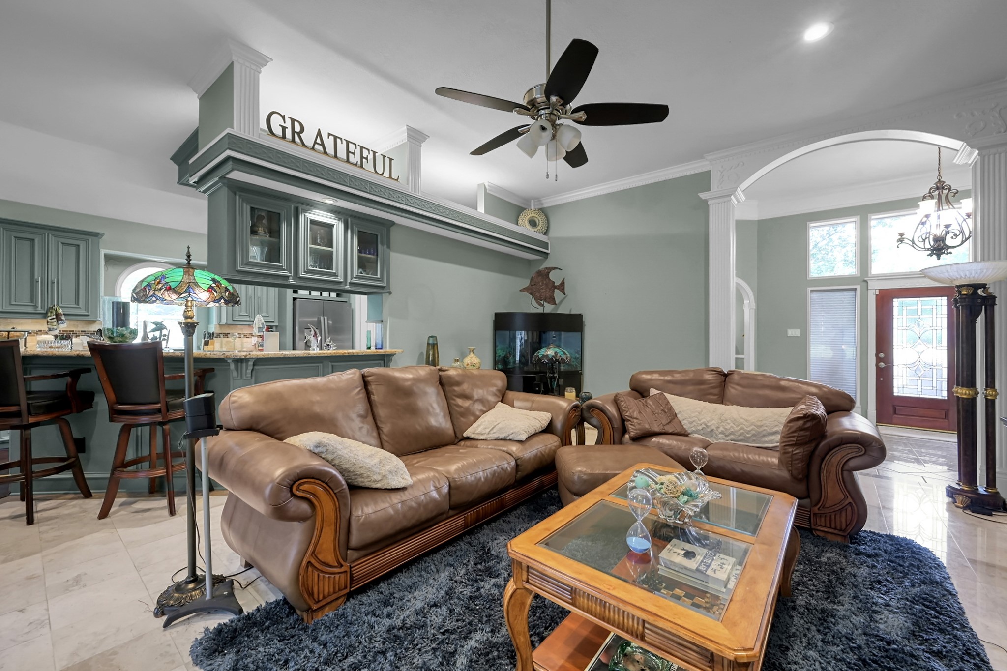 192 Monterrey Road West Montgomery, TX 77356 - Photo 12 of 45 a living room with furniture a ceiling fan and a rug