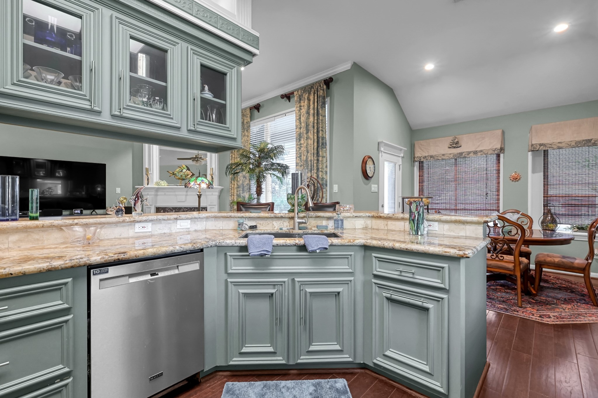 192 Monterrey Road West Montgomery, TX 77356 - Photo 17 of 45 a kitchen with stainless steel appliances granite countertop a stove and cabinets