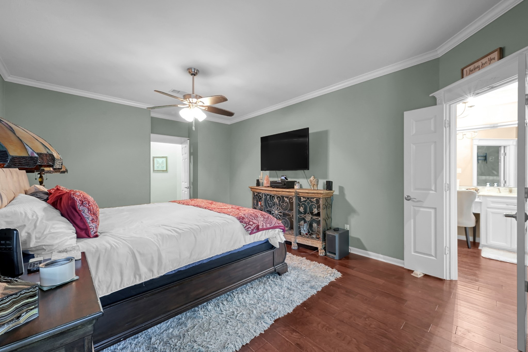192 Monterrey Road West Montgomery, TX 77356 - Photo 23 of 45 a bedroom with a bed and a flat screen tv