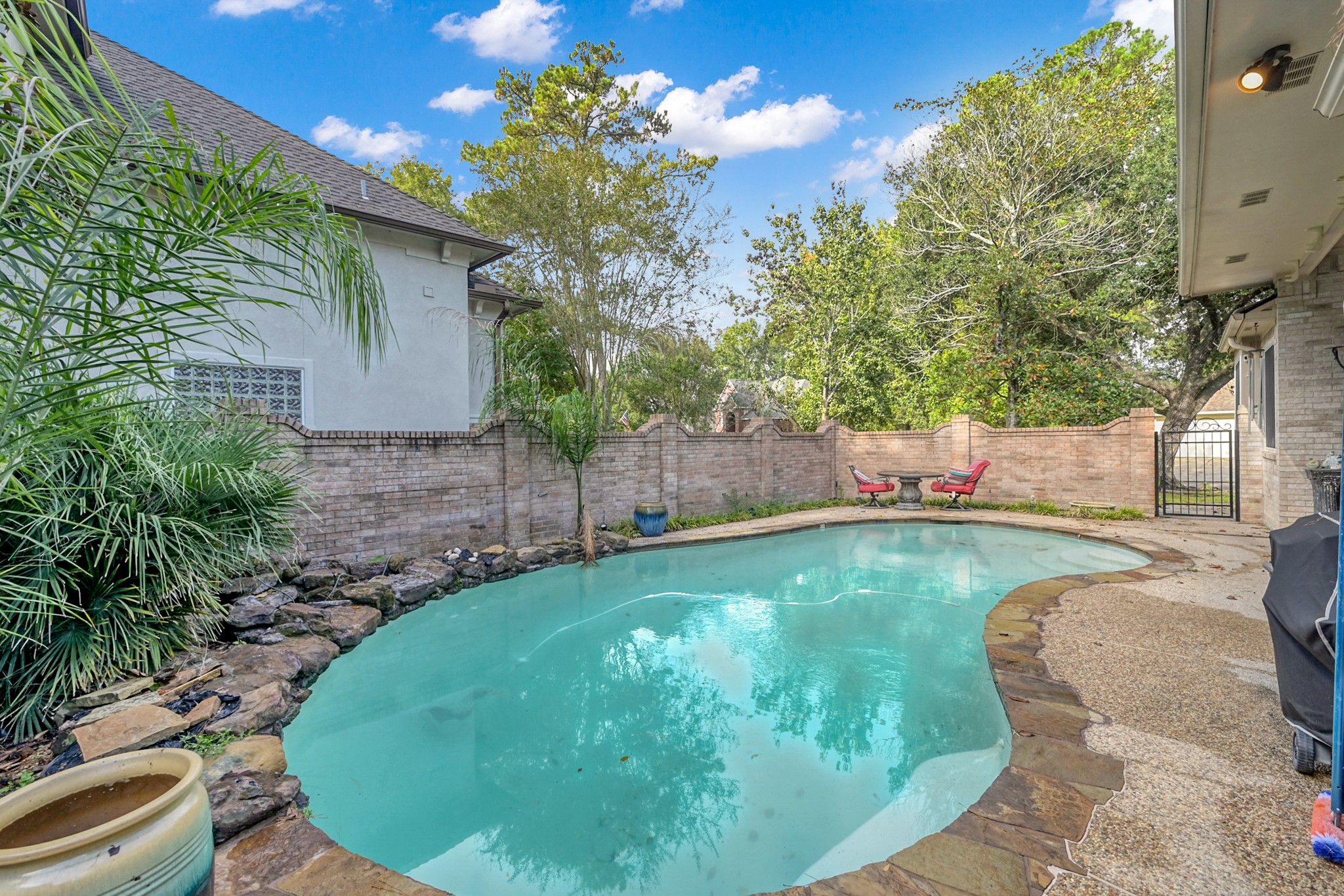 192 Monterrey Road West Montgomery, TX 77356 - Photo 40 of 45 a view of a swimming pool in a backyard