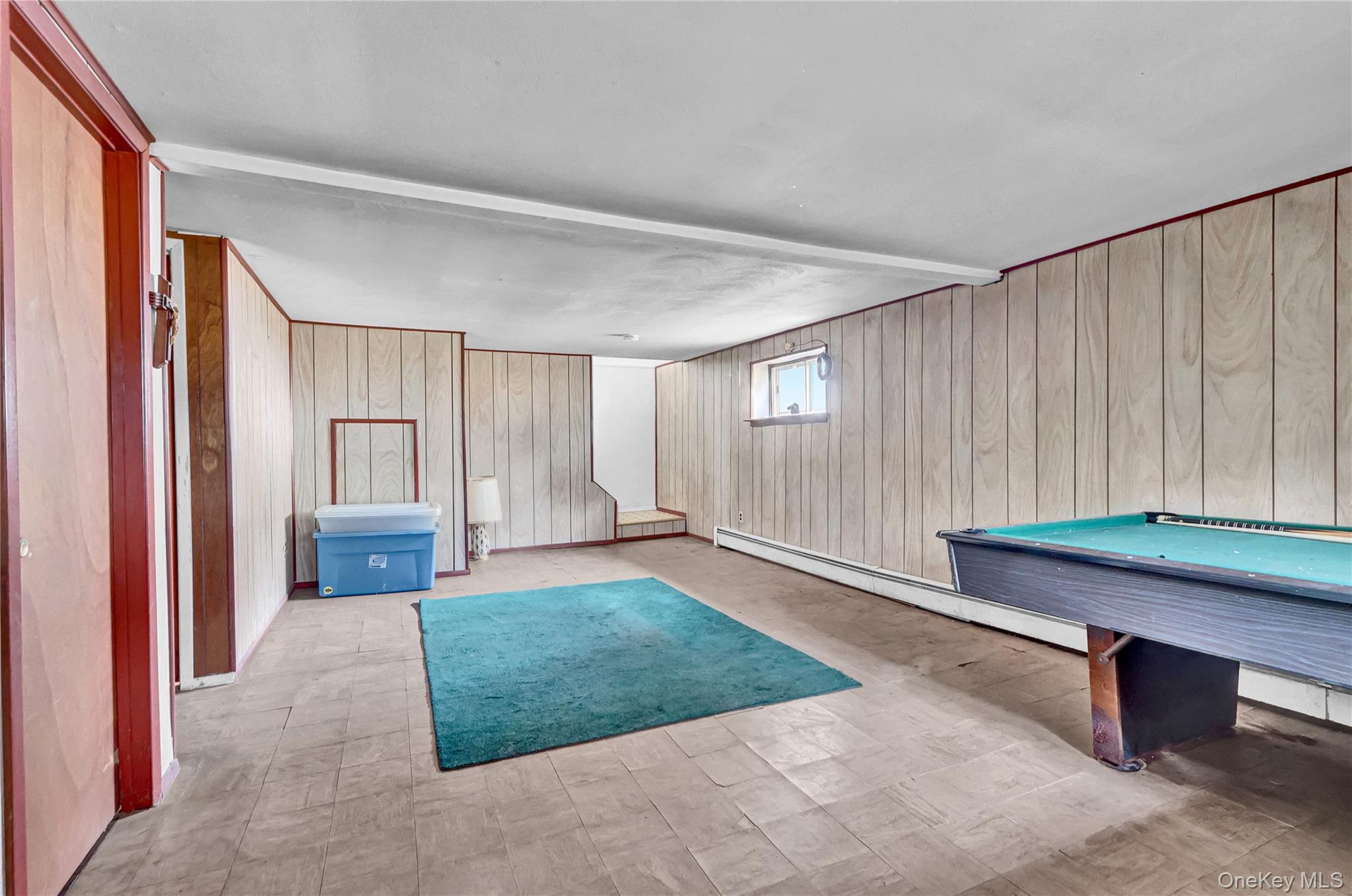 70 Blue Point Road Selden, NY 11784 - Photo 20 of 27 a room with pool table and a window