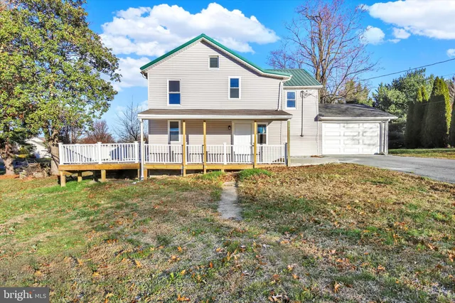 a house view with a garden space