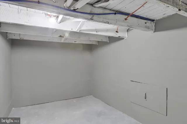 a view of a room with racks on the wall