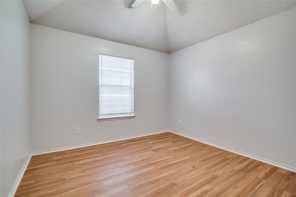 2401 Redfield Drive Mesquite, TX 75181 - Photo 17 of 25 a view of empty room with wooden floor