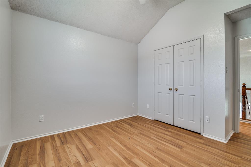 2401 Redfield Drive Mesquite, TX 75181 - Photo 18 of 25 a view of empty room with wooden floor