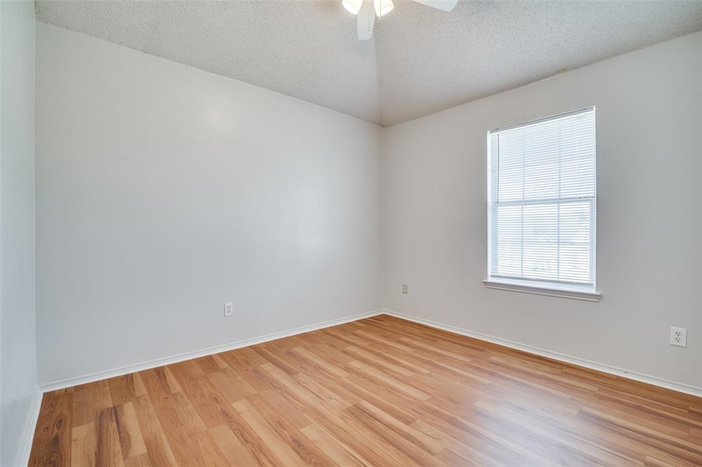 2401 Redfield Drive Mesquite, TX 75181 - Photo 19 of 25 a view of empty room with wooden floor