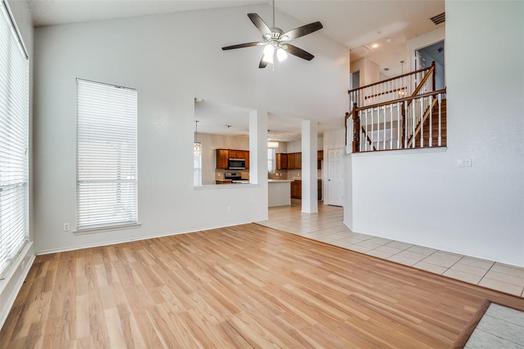 2401 Redfield Drive Mesquite, TX 75181 - Photo 6 of 25 a view of empty room with wooden floor and fan