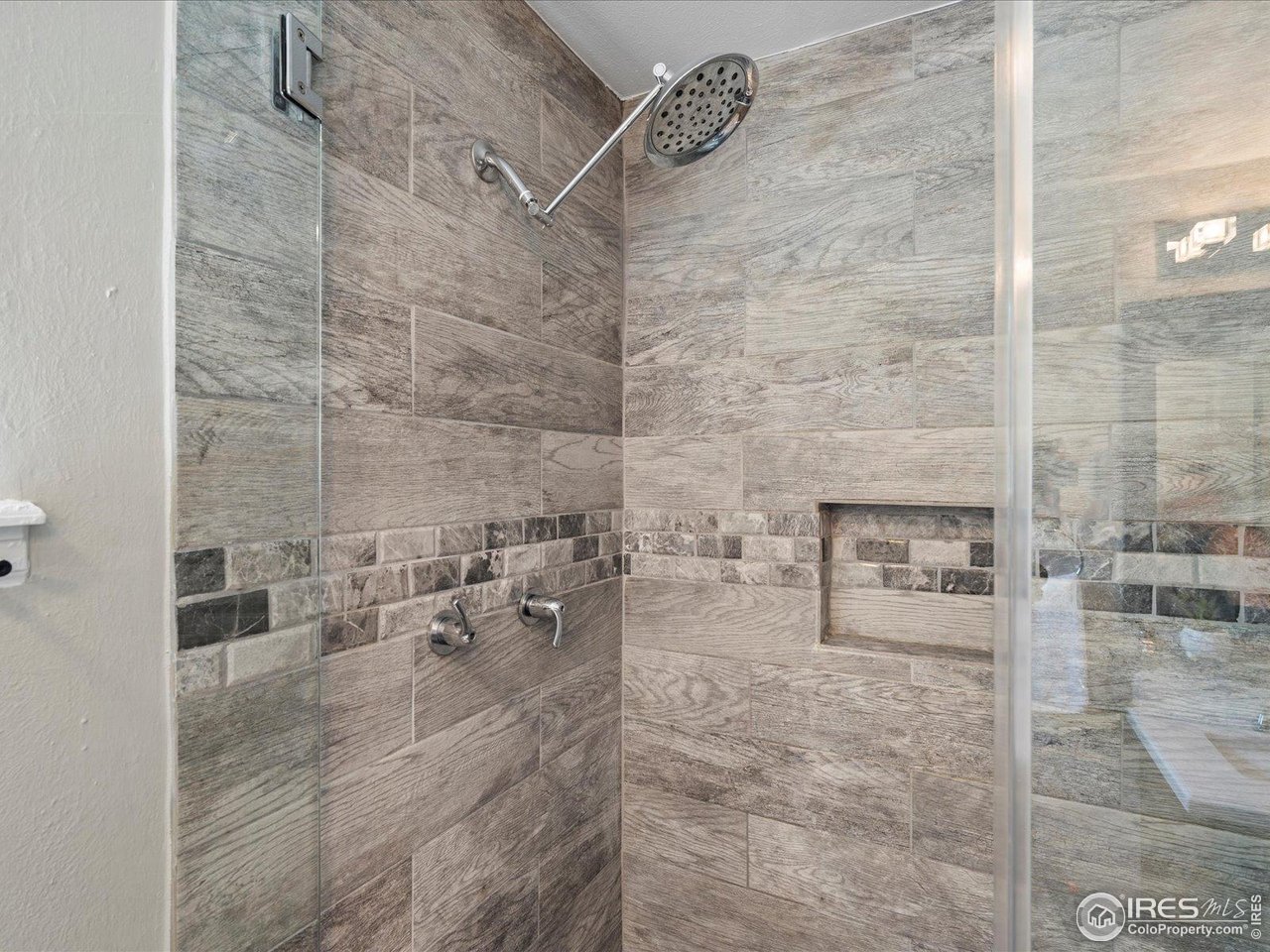 7466 Old Post Road Boulder, CO 80301 - Photo 25 of 36 a bathroom with a shower
