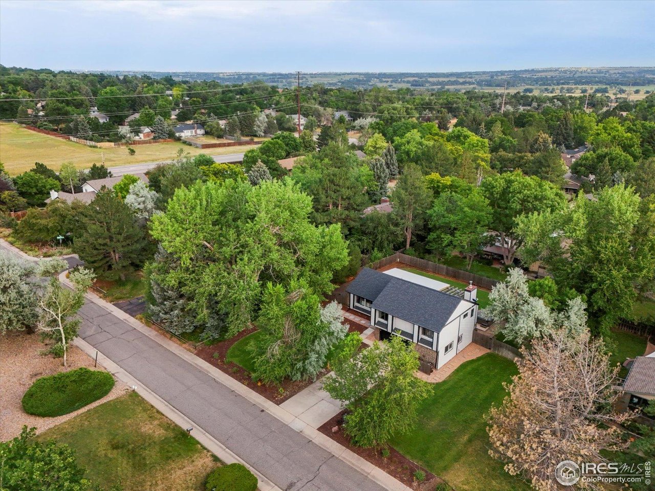 7466 Old Post Road Boulder, CO 80301 - Photo 3 of 36 an aerial view of a house with a garden