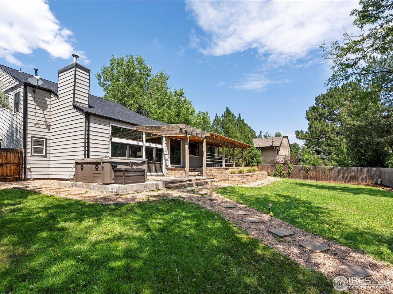 7466 Old Post Road Boulder, CO 80301 - Photo 33 of 36 a house view with a sitting space and garden