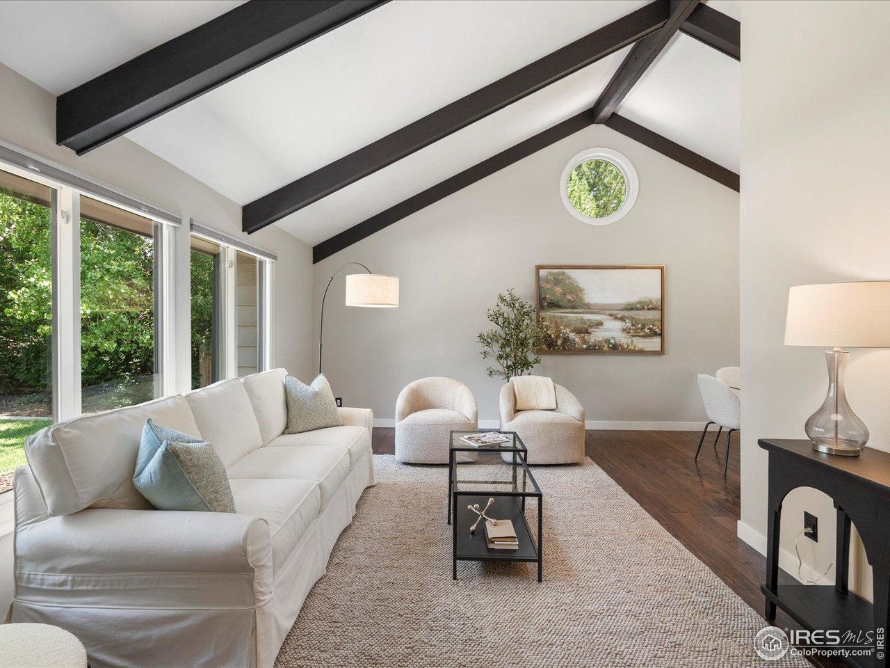 7466 Old Post Road Boulder, CO 80301 - Photo 7 of 36 a living room with furniture and a window