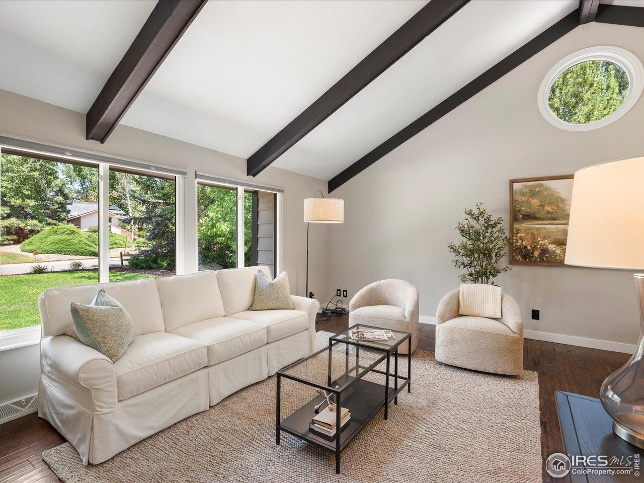 7466 Old Post Road Boulder, CO 80301 - Photo 8 of 36 a living room with furniture and a large window