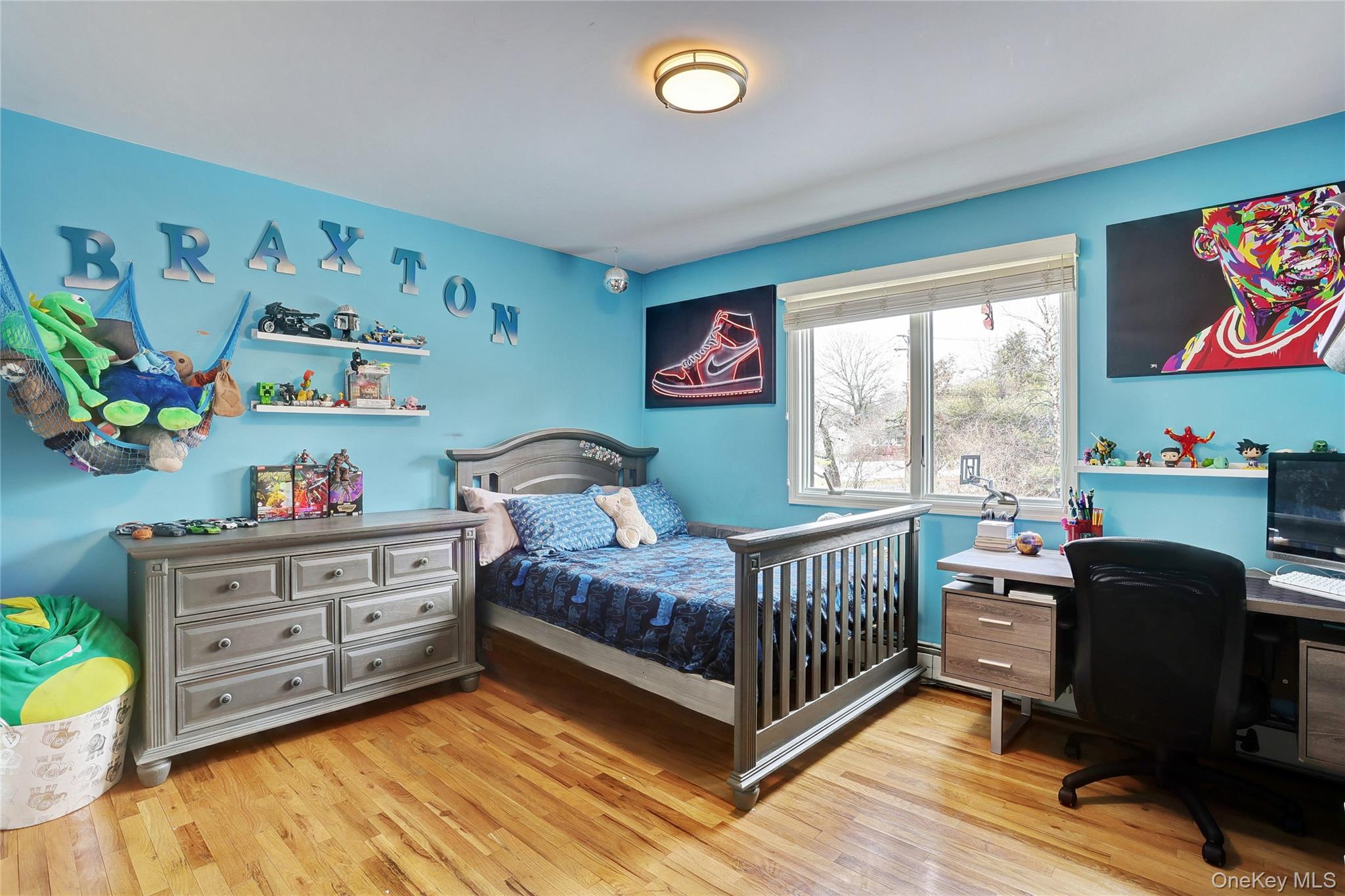 42 Cragmere Road Airmont, NY 10901 - Photo 17 of 32 a bedroom with a bed and a window