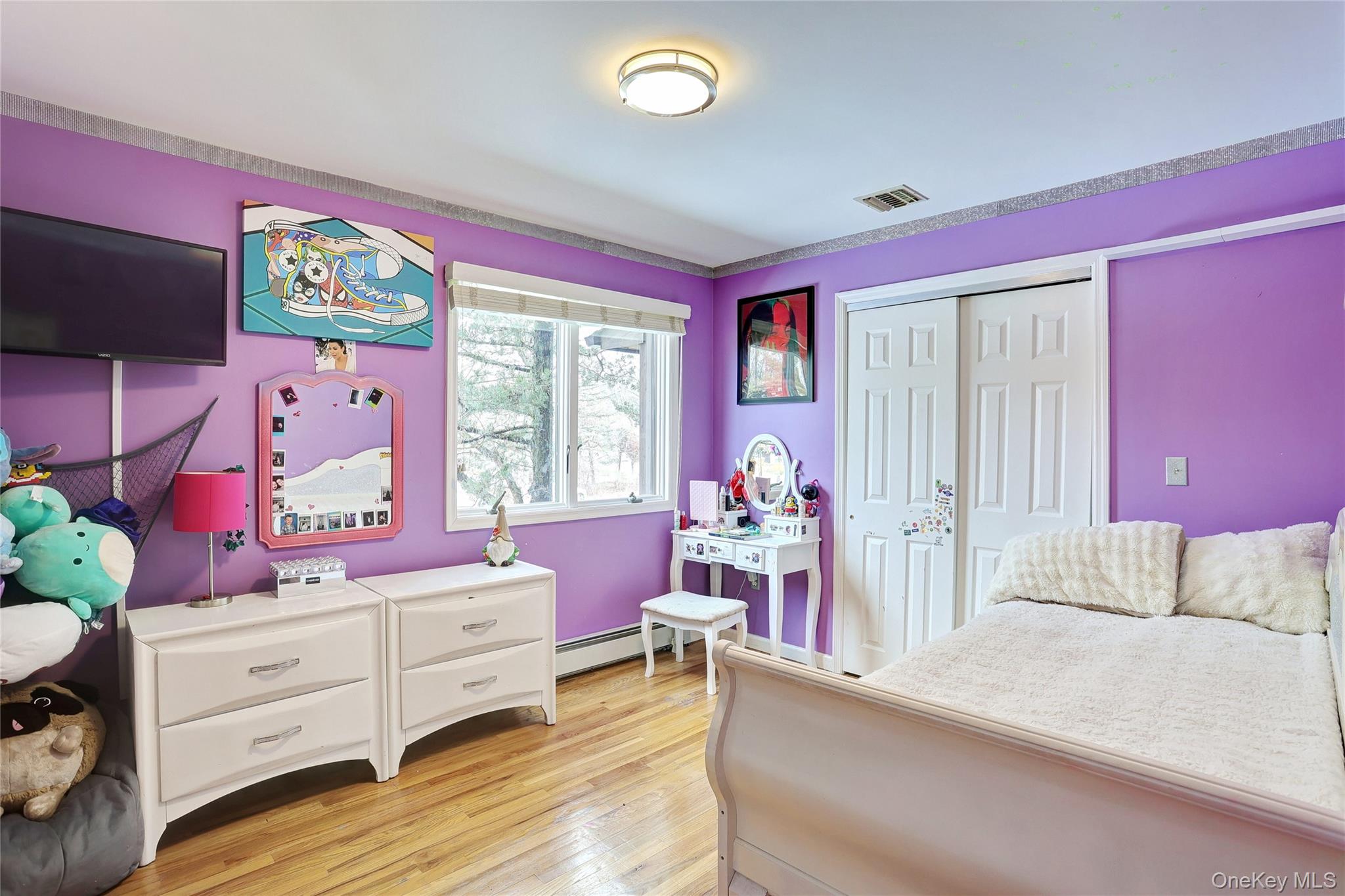 42 Cragmere Road Airmont, NY 10901 - Photo 18 of 32 a bedroom with a bed and a window