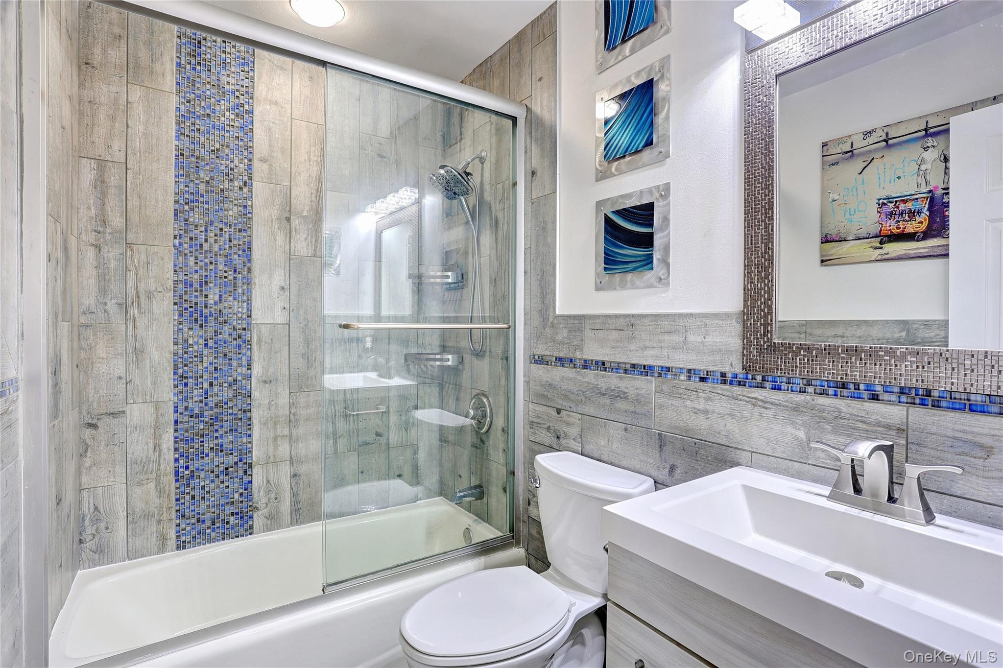 42 Cragmere Road Airmont, NY 10901 - Photo 19 of 32 a bathroom with a sink toilet and shower
