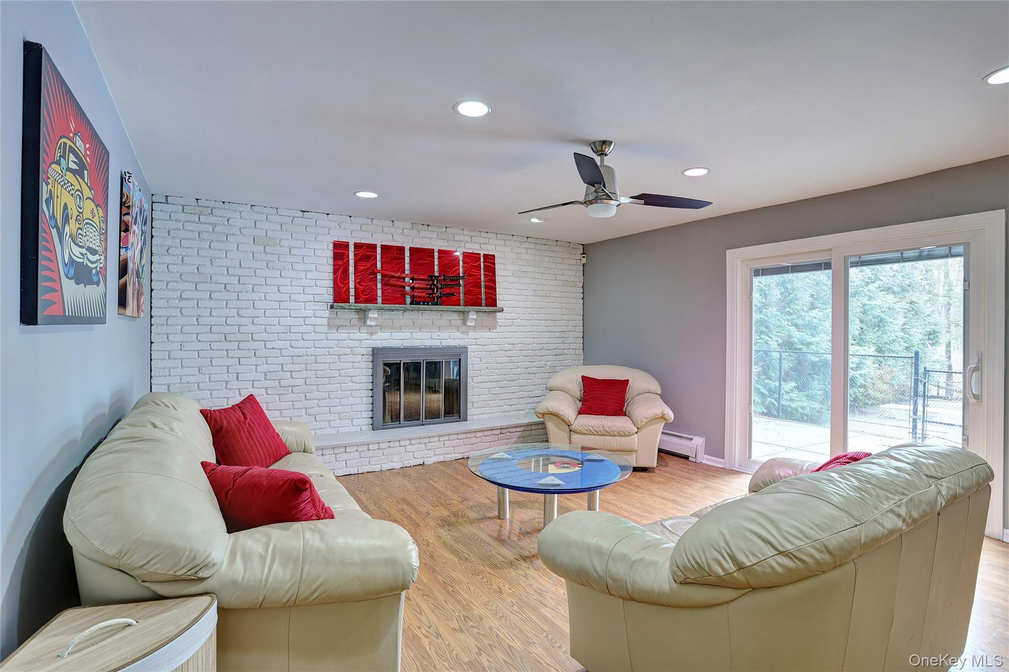 42 Cragmere Road Airmont, NY 10901 - Photo 20 of 32 a living room with furniture flower pot and a fireplace