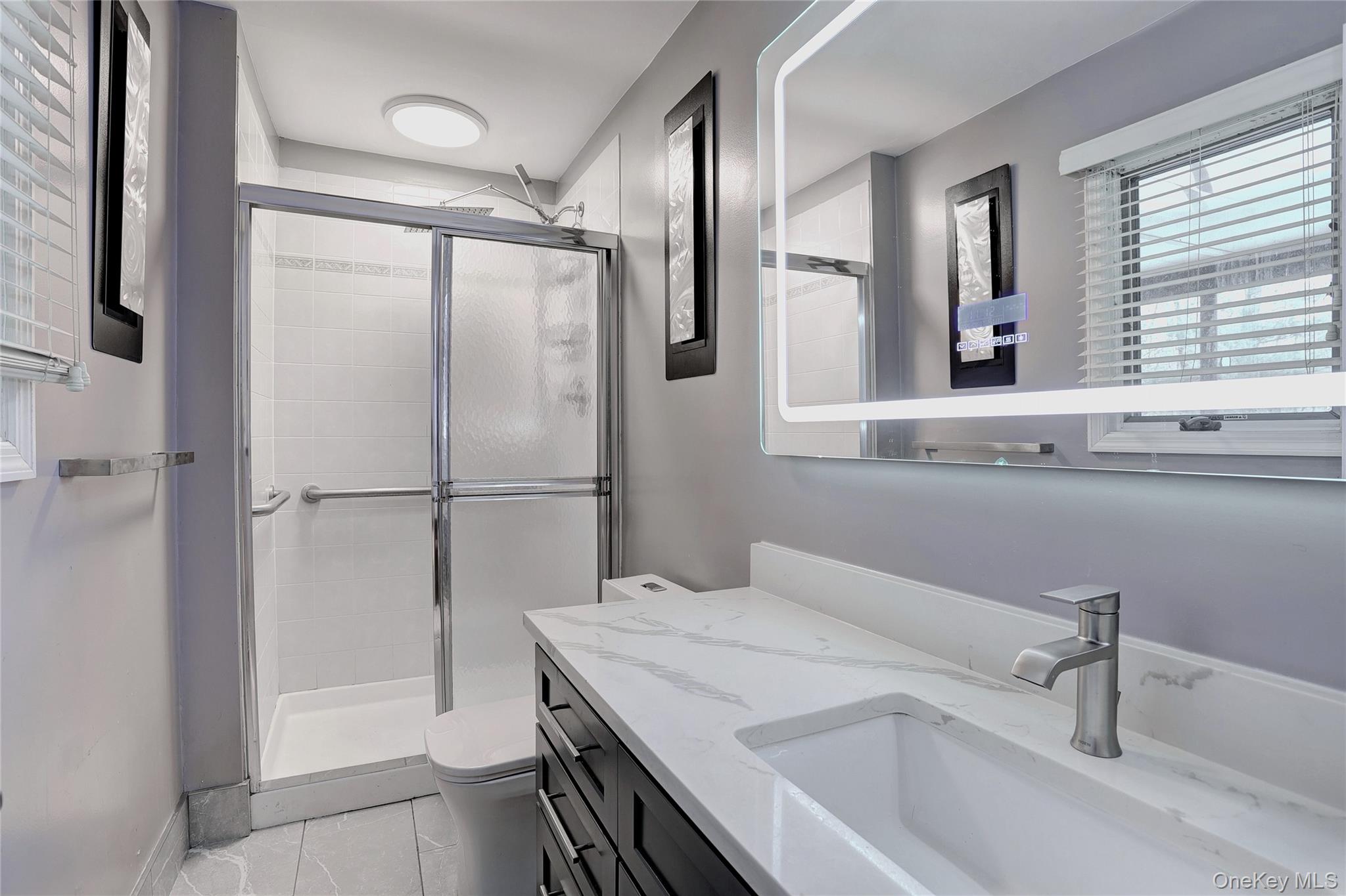 42 Cragmere Road Airmont, NY 10901 - Photo 22 of 32 a bathroom with a sink and a mirror