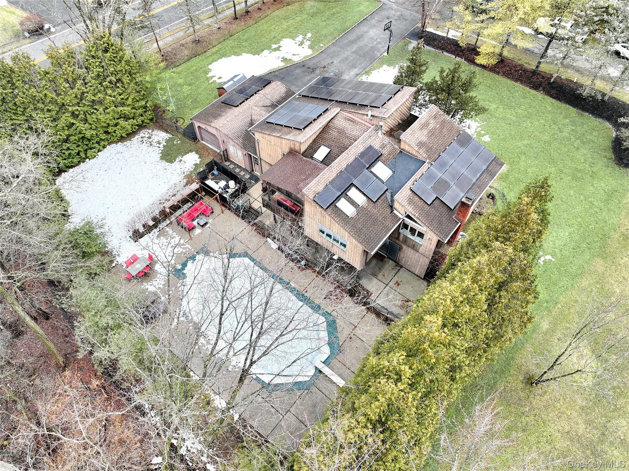 42 Cragmere Road Airmont, NY 10901 - Photo 31 of 32 an aerial view of a house with a yard and garden
