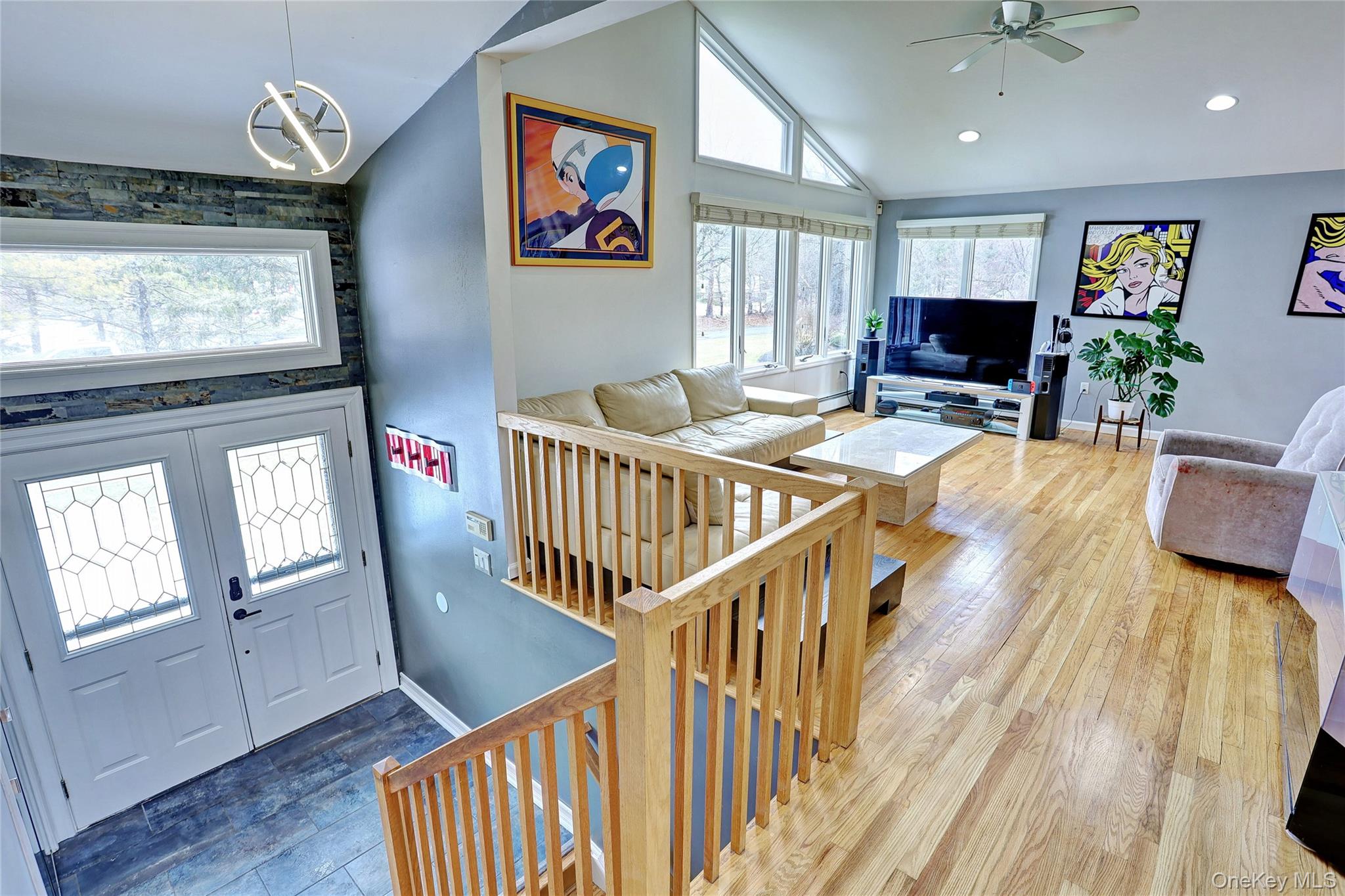 42 Cragmere Road Airmont, NY 10901 - Photo 4 of 32 a view of a livingroom with furniture window wooden floor and front door