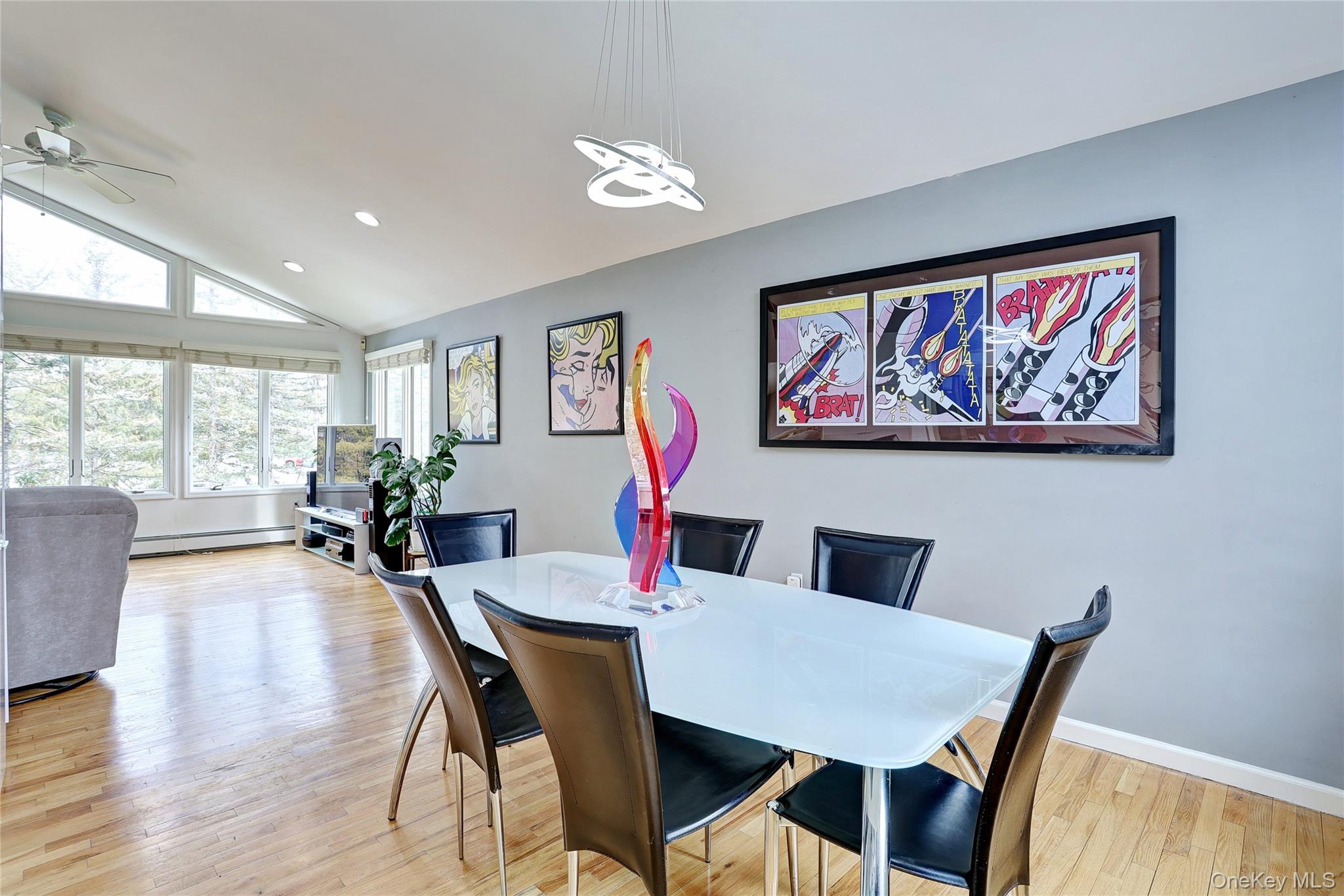 42 Cragmere Road Airmont, NY 10901 - Photo 7 of 32 a view of a dining room with furniture a chandelier and wooden floor