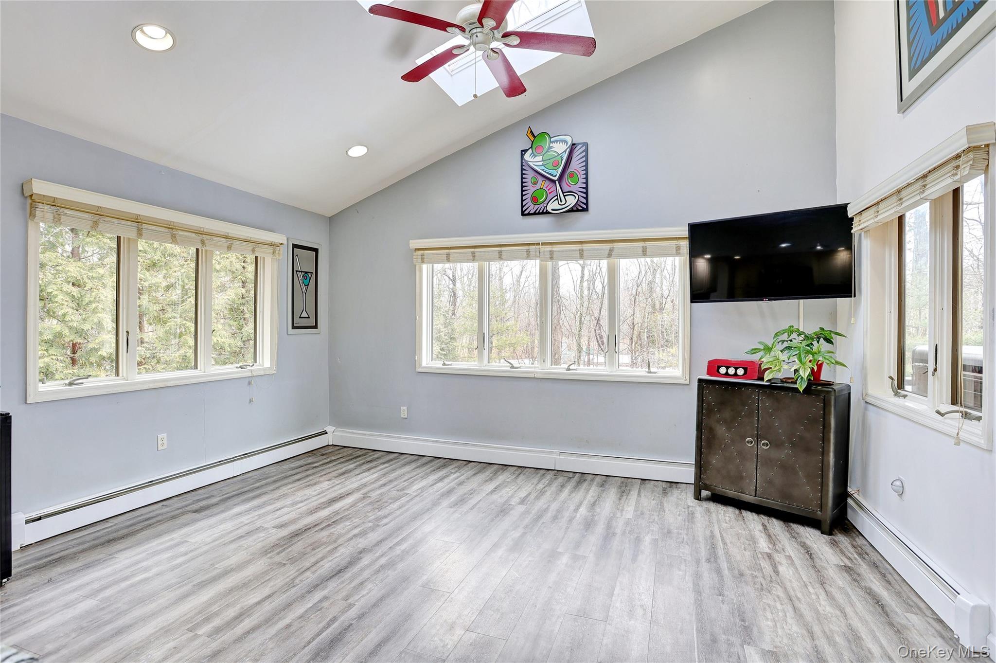 42 Cragmere Road Airmont, NY 10901 - Photo 10 of 32 wooden floor in an empty room with a window
