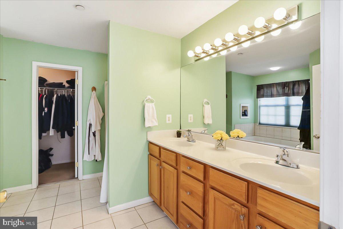 2431 Gilbert Street Broomall, PA 19008 - Photo 20 of 38 Primary bath with double vanity & walk in closet