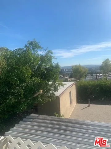 a balcony with an outdoor space