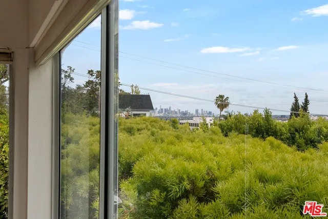 a view of a lake from a balcony