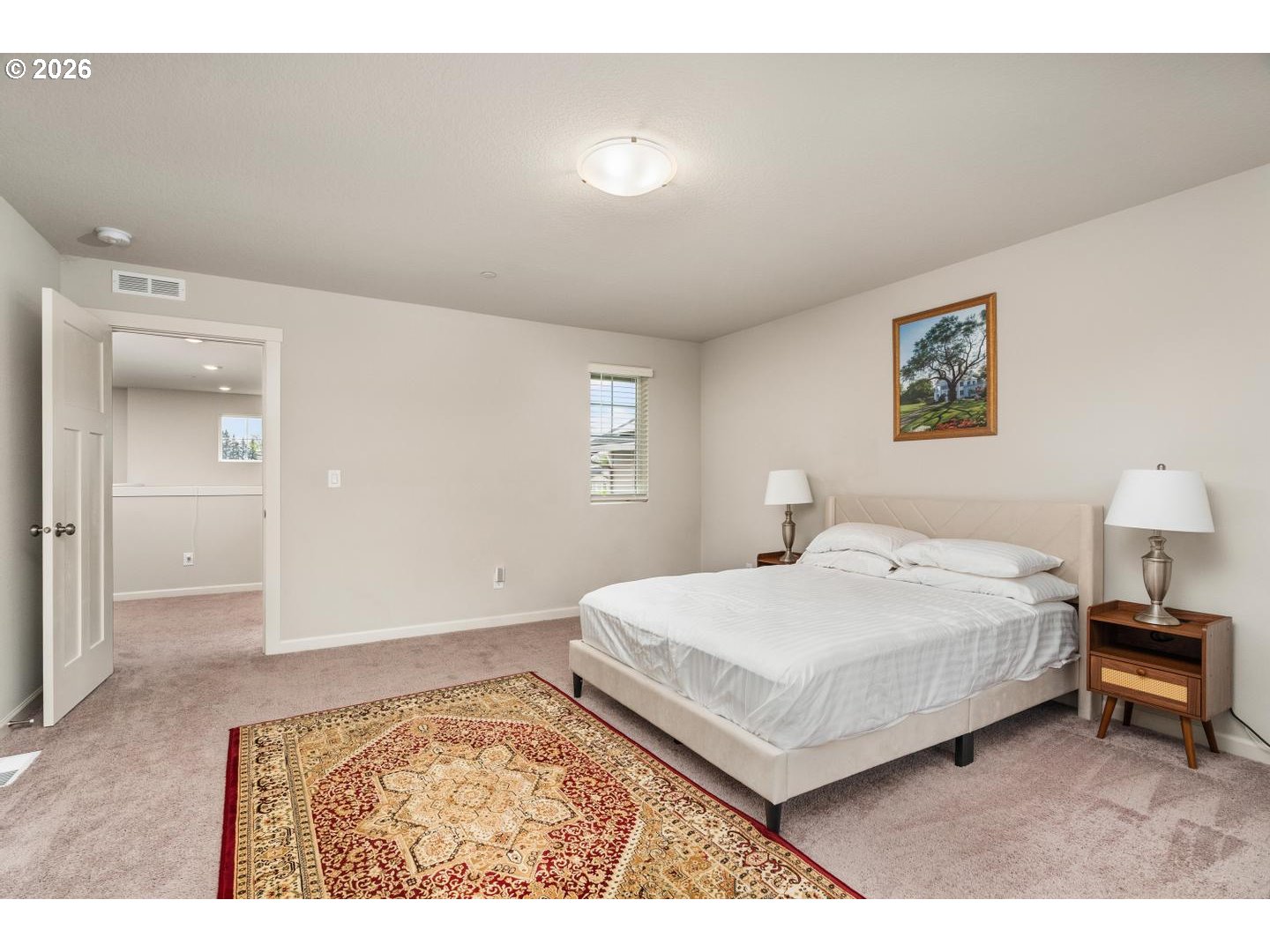 6301 North 89th Avenue Camas, WA 98607 - Photo 20 of 39 a bedroom with a bed and a lamp