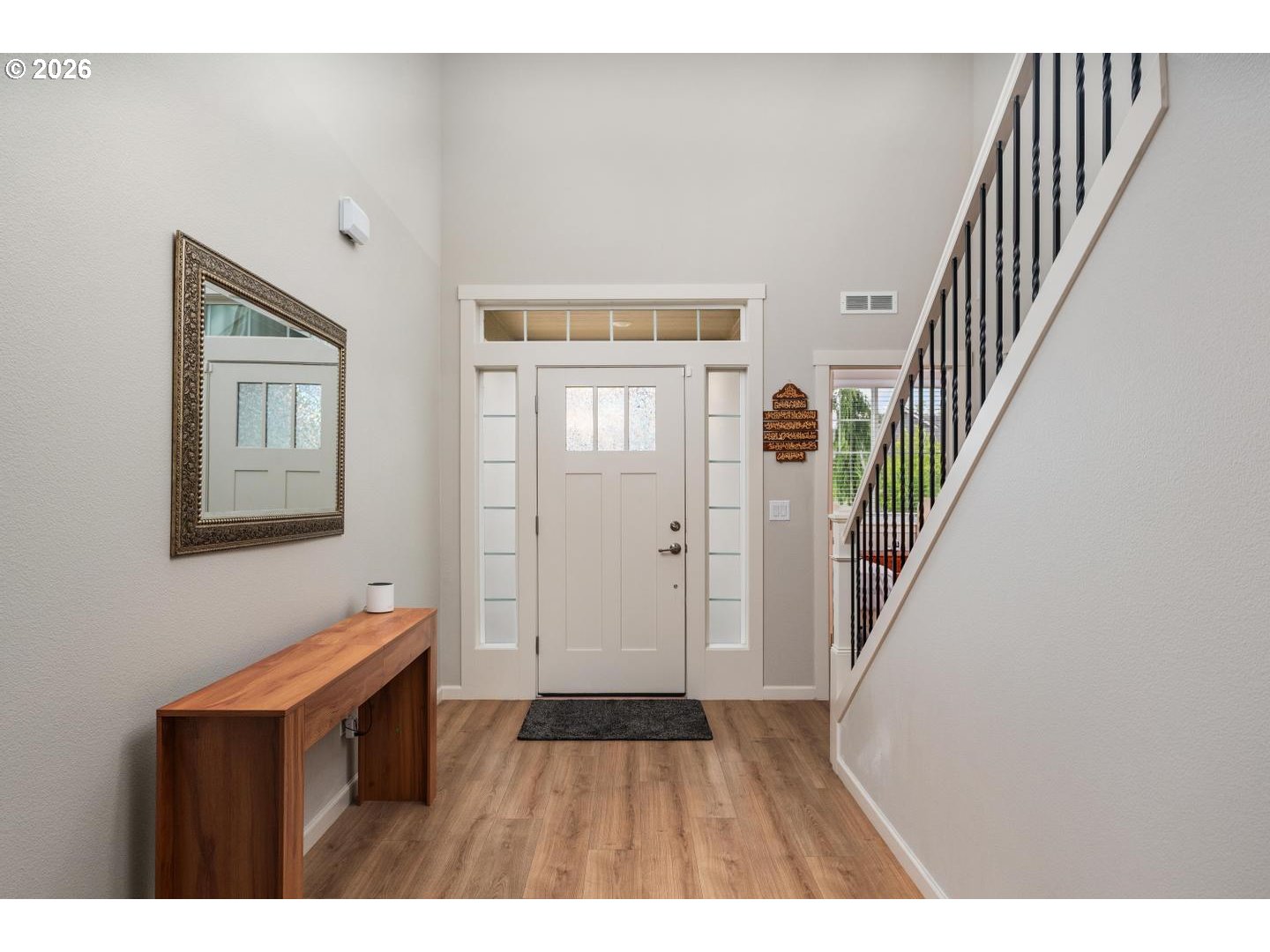 6301 North 89th Avenue Camas, WA 98607 - Photo 3 of 39 a view of an entryway with wooden floor