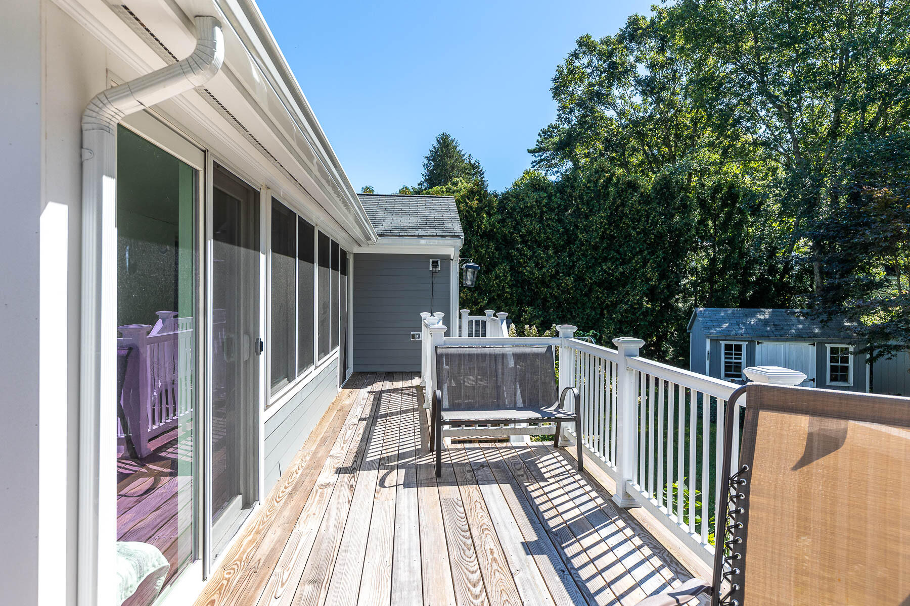 8 Cutlass Lane Mashpee, MA 02649 - Photo 16 of 30 a view of balcony with furniture and trees