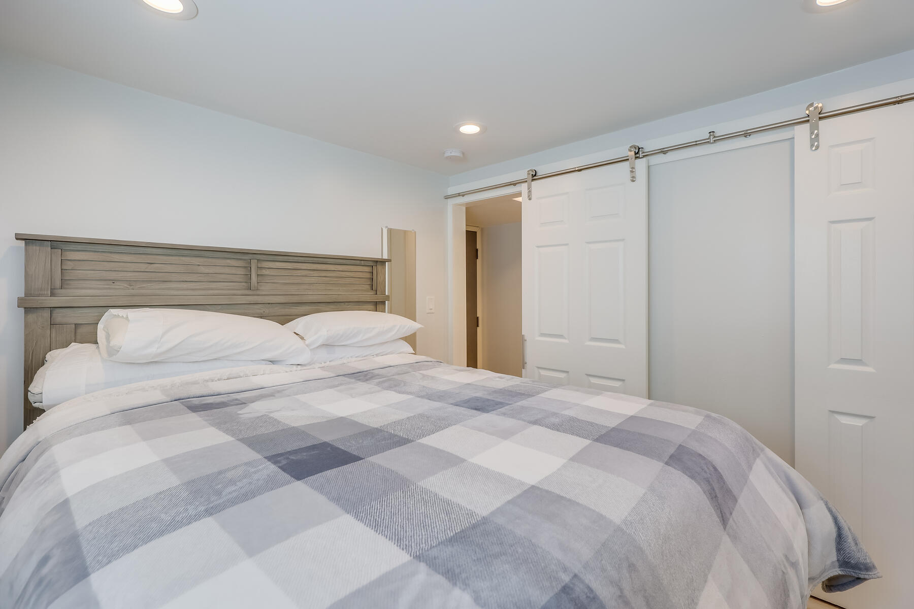 8 Cutlass Lane Mashpee, MA 02649 - Photo 23 of 30 a bedroom with a large bed and a shower