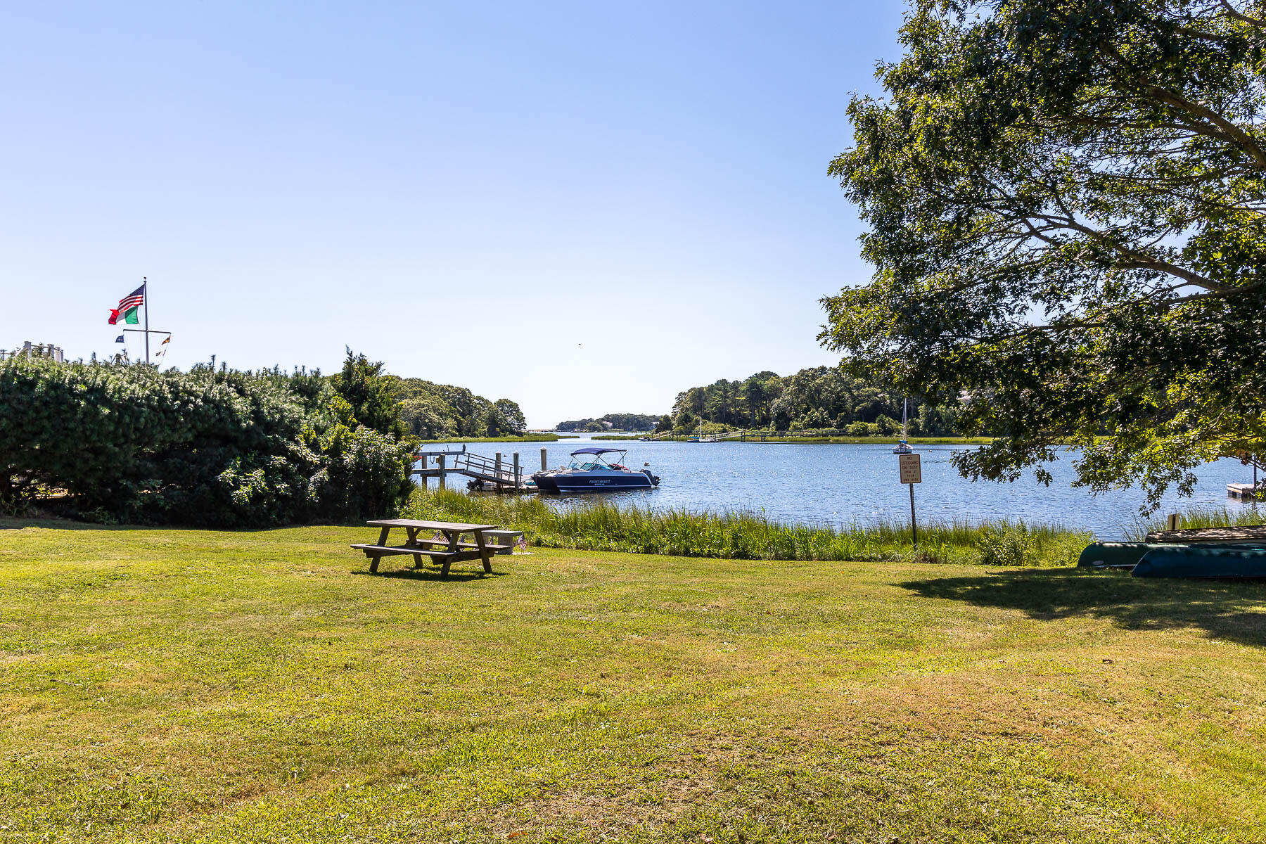 8 Cutlass Lane Mashpee, MA 02649 - Photo 27 of 30 a view of a swimming pool with an outdoor seating