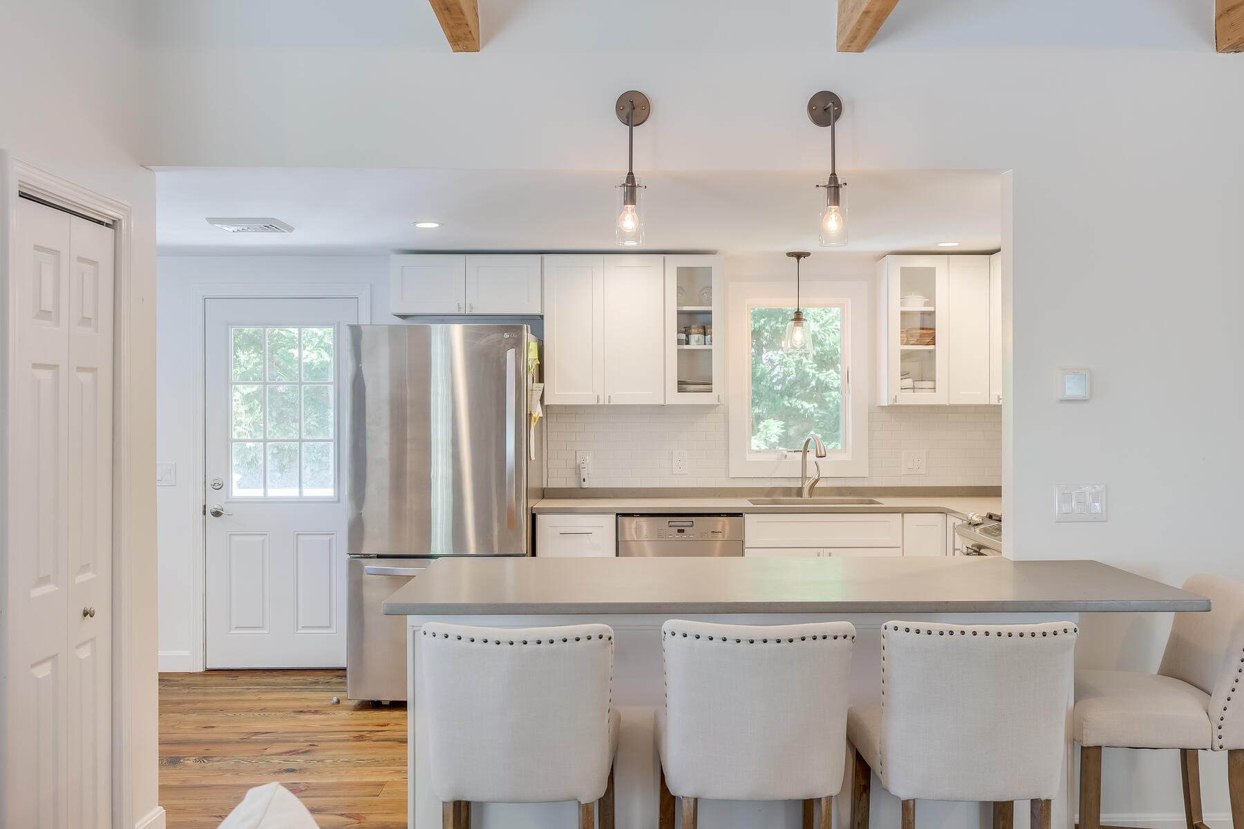 8 Cutlass Lane Mashpee, MA 02649 - Photo 6 of 30 a kitchen with stainless steel appliances granite countertop a sink and a refrigerator