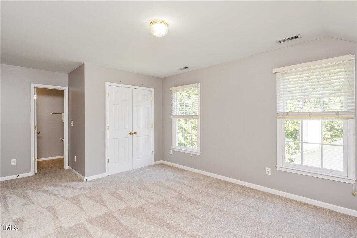 714 Continental Drive Durham, NC 27712 - Photo 25 of 34 a view of an empty room with a window